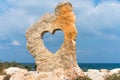 Heart in a rock sign