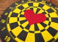 The heart of love is the target of the dart