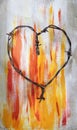 Heart made of barbed wire with red and yellow background Royalty Free Stock Photo