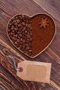 Heart made from bean and instant coffee and blank tag.