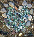 Heart made of colorful stones and glass at Steklyannaya Bay. Royalty Free Stock Photo