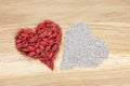 Heart made of dried goji berries and chia seeds Royalty Free Stock Photo