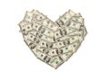 Heart made of hundred dollar banknotes isolated