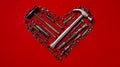 A heart made out of tools on a red background Royalty Free Stock Photo