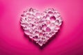 Heart made of quartz crystals on contrast pink background, Valentine\'s Day