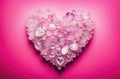 Heart made of quartz crystals on contrast pink background, Valentine\'s Day