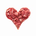 the heart is made from raw meat isolate. beef in the shape of a heart, symbolizes heart disease, overeating, cooking or Royalty Free Stock Photo