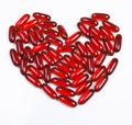 Heart made of red capsule Royalty Free Stock Photo