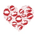 Heart made of red lipstick prints on a white background