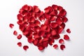 heart made of red rose petals isolated on white background top view, valentines day design Royalty Free Stock Photo