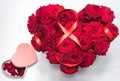 Heart Made Red Roses bouquet red ribbon figure 8 heart shape box with petals Isolated White Background.