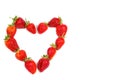 Heart made from red strawberries on a white background Royalty Free Stock Photo