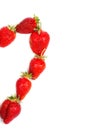 Heart made from red strawberries on a white background Royalty Free Stock Photo