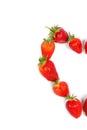 Heart made from red strawberries on a white background Royalty Free Stock Photo