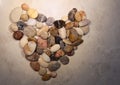 Heart made of sea stones. Valentine`s Day Royalty Free Stock Photo