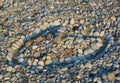 Heart made of stones on beach Royalty Free Stock Photo