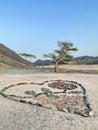 Heart made of stones in the desert.