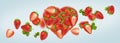 Heart made of strawberries isolated on white background Royalty Free Stock Photo