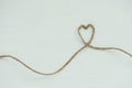 Heart made from string on white background Royalty Free Stock Photo
