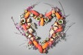 Heart made of sushi and flowers. Love sushi