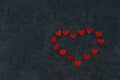 The heart is made up of small figures on a soft blanket Royalty Free Stock Photo