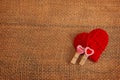 heart made of wool threads on burlap Royalty Free Stock Photo