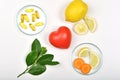 Heart model and Vitamin nutrition pills with fresh fruit and vegetable, Healthy diet, Vitamin and mineral supplement Royalty Free Stock Photo