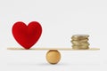 Heart and money on balance scale - Order of priority in life among love and money Royalty Free Stock Photo