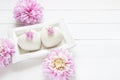 Heart mousse cakes covered with white chocolate velvet decorated of pink flowers