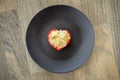 Heart muffin on brown plate. Lovely morning breakfast. Romantic love symbol Royalty Free Stock Photo