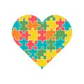 Heart with multicolored puzzle pieces inside, isolated on white background. Love, medical, relationship symbol. Autism Royalty Free Stock Photo