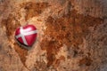 Heart with national flag of denmark on a vintage world map crack paper background Royalty Free Stock Photo