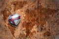 Heart with national flag of faroe islands on a vintage world map crack paper background. Royalty Free Stock Photo