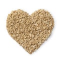 Heart of oat flakes close up on white background Royalty Free Stock Photo