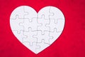 Heart object made of puzzle pieces. Make complete heart. Jigsaw puzzle pieces in form of heart. Happy Valentines Day, greeting