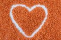 Heart of organic red lentils on white background, top view Royalty Free Stock Photo