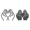 Heart in palms line and solid icon, love or health care concept, Human hands holding heart vector sign on white Royalty Free Stock Photo