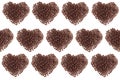 Heart pattern of heap roasted coffee beans isolated on white background. Royalty Free Stock Photo