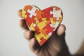 Heart patterned with puzzle pieces, for the autism Royalty Free Stock Photo