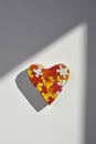 Heart patterned with puzzle pieces, for the autism Royalty Free Stock Photo