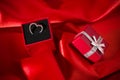 Heart pendant in a red gift box Royalty Free Stock Photo