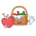 With heart picnic basket mascot cartoon Royalty Free Stock Photo