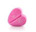 Heart of pills on white background