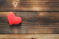 Heart placed with old wooden background