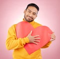 Heart, poster and love with portrait of man in studio for romance, date and valentines day. Kindness, support and hope