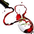 Heart from pouring red wine in goblet Royalty Free Stock Photo