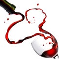 Heart from pouring red wine in goblet Royalty Free Stock Photo