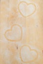 Heart prints and drawing with flour on the board.