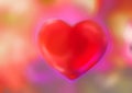 Heart on a red blurred background, colored abstraction, rainbow pattern, glow colors