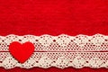 Heart on red cloth background Royalty Free Stock Photo